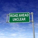 -road-ahead-unclear-green-freeway-sign-representing-uncertainty-in-financial-business